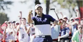  ??  ?? CHASKA: In this Oct 2, 2016, file photo, United States’ Patrick Reed reacts after winning the fifth hole during a singles match at the Ryder Cup golf tournament, at Hazeltine National Golf Club in Chaska, Minn. American golfers are traveling more than...