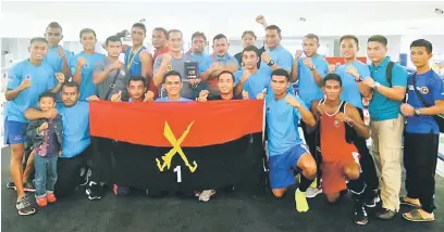  ??  ?? TERBAIK: Barisan petinju PCT 1 Divisyen yang menyertai Kejohanan Tinju Amatur ‘Stand’ 2018 di Sabah.
