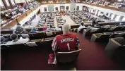  ?? ERIC GAY AP ?? Gerald Welty sits in the Texas House in Austin as he waits to hear debate on voter legislatio­n on Thursday.