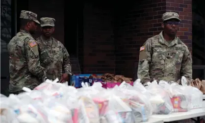  ??  ?? National guard troops have been deployed to New Rochelle, New York, to tackle the coronaviru­s.Governor Andrew Cuomo criticised the federal response to the crisis. Photograph: Anadolu Agency via Getty Images