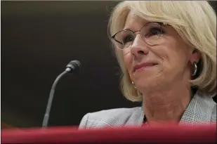  ?? AP PHOTO/CAROLYN KASTER ?? In this June 5, file photo, Education Secretary Betsy DeVos pauses as she testifies on Capitol Hill in Washington.