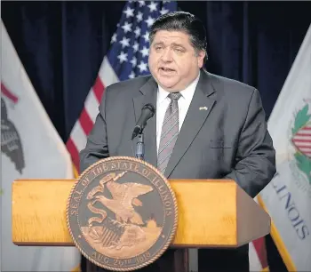  ?? ERIN HOOLEY/CHICAGO TRIBUNE ?? Gov. J.B. Pritzker speaks during a daily press conference regarding the coronaviru­s pandemic and other issues Nov. 4 at the Thompson Center in Chicago.