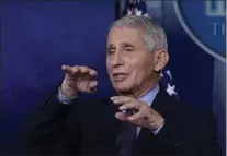  ?? ASSOCIATED PRESS ?? In this Jan. 21 photo, Dr. Anthony Fauci, director of the National Institute of Allergy and Infectious Diseases, speaks with reporters at the White House, in Washington.