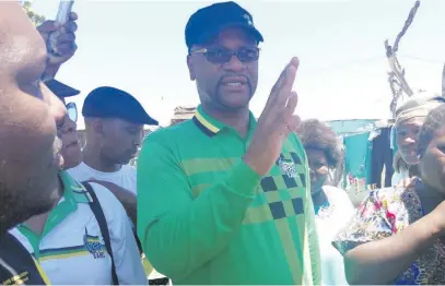  ?? Picture: ANA Reporter ?? TOLD OFF: Minister Nathi Mthethwa receives a hostile reception as Eastern Cape residents accuse the ANC of using them for votes.