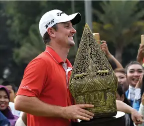  ?? AFP ?? Justin Rose fought off jet lag and rain delays to win the title in Jakarta