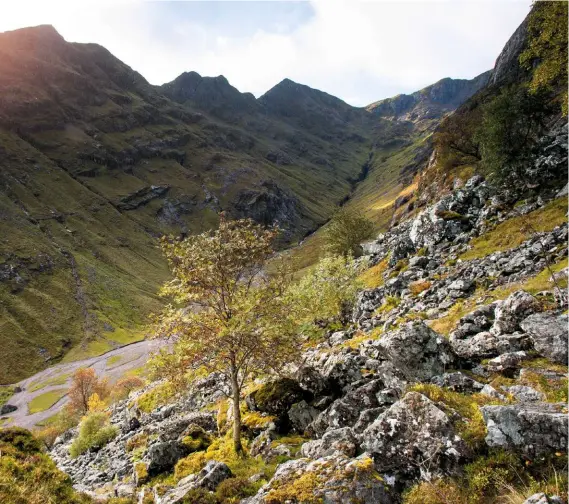  ??  ?? The prized hanging valley trickling down from the upper ramparts of 1150m Bidean nam Bian, with its summit hidden out of sight to the right.