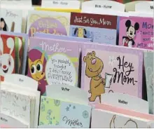  ?? LOS ANGELES TIMES FILE PHOTO ?? A selection of greeting cards are displayed at a Hallmark store.