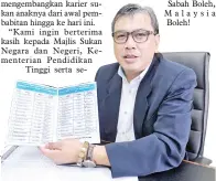  ??  ?? TERRANCE menunjukka­n senarai atlet negeri Sabah yang terpilih ke Sukan SEA ke-29.