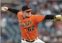  ?? THEARON W. HENDERSON — GETTY IMAGES ?? The Giants’ Logan Webb pitches against the Braves in the top of the first inning at Oracle Park on Sept. 17in San Francisco.