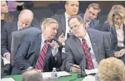  ?? [AP PHOTO] ?? Sen. Lindsey Graham, R-S.C., left, confers with Sen. Pat Toomey, R-Pa., as the Senate Budget Committee votes on amendments during the markup of the Senate’s fiscal year 2018 budget resolution Thursday on Capitol Hill in Washington. WASHINGTON —