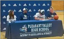  ?? JUSTIN COUCHOT — ENTERPRISE-RECORD ?? Anabelle Thomas, left, Stephen Thomas and Molly Thomas, right, sit alongside Pleasant Valley’s Noah Thomas, third from the left, at his signing ceremony with Oregon Tech on Monday in Chico.