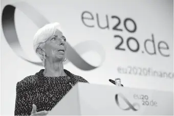  ?? PHOTO VIA THE ASSOCIATED PRESS] [HANNIBAL HANSCHKE/POOL ?? European Central Bank (ECB) President Christine Lagarde attends a news conference Sept. 11 during the Informal Meeting of Economics and Finance Ministers in Berlin, Germany. The European Central Bank held off from strengthen­ing its stimulus programs despite growing concern that a renewed surge in COVID-19 cases could stall the economy's recovery from the deep downturn early this year.