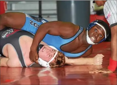  ?? GREGG SLABODA — TRENTONIAN PHOTO ?? Hightstown senior Johnny Andre, right, is 24 wins shy of the school record.