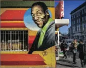  ??  ?? The mural of US comedian Bill Cosby on the side of Ben’s Chili Bowl in 2014.