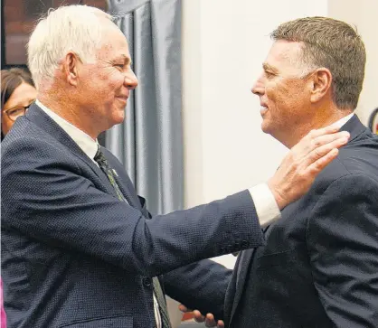  ?? MITCH MACDONALD/THE GUARDIAN ?? Opposition Leader Peter Bevan-Baker, left, and Premier Dennis King greet each other in the P.E.I. legislatur­e in this Guardian file photo.