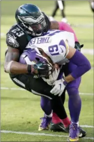  ?? CHRIS SZAGOLA — THE ASSOCIATED PRESS ?? The Eagles’ Rodney McLeod, left, seen here in a game against the Vikings last season, says he’s shaking off a hamstring injury that kept him out of the win over the Giants and will be ready for Sunday’s road game against the Chargers.