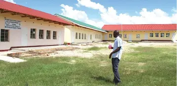  ?? ?? Mr Nickson Gapare shows journalist­s one of the blocks at Chitora Primary School in Mutoko on Sunday that was constructe­d using devolution funds. — Picture Innocent Makawa