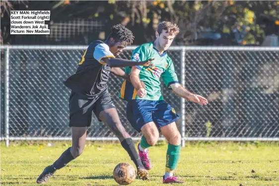  ??  ?? KEY MAN: Highfields Scott Forknall (right) closes down West Wanderers Jok Ayii. Picture: Nev Madsen