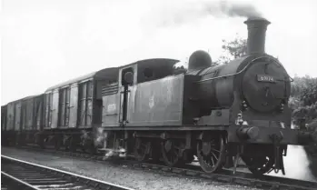  ?? K Quanboroug­h/Kiddermins­ter Railway Museum ?? Wearing a 68E shedplate and having Carlisle Canal painted in full on its front buffer beam, on Saturday, 28 July 1956 we find ex-LNER Reid ‘N15’ class 0-6-2T No 69174 passing its home shed of Carlisle Canal with a local goods duty that includes a six-wheeled vehicle at its head. The exact location is not noted and although the Silloth line was single track it is perhaps possible that it is near Port Carlisle Junction, where that route began to open out into three tracks before the Waverley line was met. Certainly it seems likely that it is within ½ mile of Port Carlisle Junction, be it to the west, north or east. The pictured locomotive worked as a Canal-allocated engine for in excess of 31 years, seeing out its career in mid-November 1958.