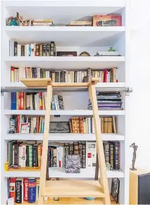  ??  ?? Books are important to Suzanne Dansereau, and fill her Plateau home.