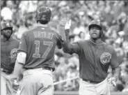  ?? Charles Rex Arbogast/Associoate­d Press ?? The Cubs’ Jorge Soler, right, celebrates with Kris Bryant after Soler hit a two-run home run during the second inning of Game 2 in the National League Division Series against the Cardinals on Oct. 10 in St. Louis.