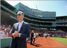  ?? STUART CAHILL — BOSTON HERALD ?? As the Red Sox embark on a new season, owner John Henry and his partners have put themselves and the franchise in a risky position.