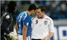  ?? Photograph: Oleg Popov/Reuters ?? Wayne Rooney argues with Tal Ben Haim during England’s Euro 2008 qualifier in Israel – and not a rainbow in sight.