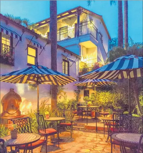  ?? Jaime Kowal Photograph­y ?? CASA LAGUNA in Laguna Beach is a 23-room hotel dating to the 1920s. There are plenty of patios and umbrellas for relaxing outdoors.