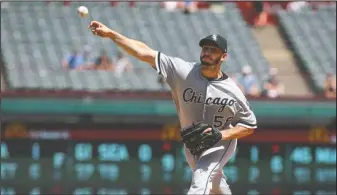  ?? The Associated Press ?? HOT PITCHING: Chicago White Sox starting pitcher Miguel Gonzalez (58) delivers a pitch in the second inning against the Texas Rangers at Globe Life Park in Arlington, Texas, Sunday.