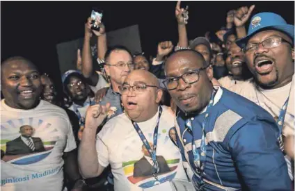  ??  ?? Dismissing criticism: Newly elected Western Cape DA leader Bonginkosi Madikizela (in blue shirt) says he has a proven track record of what he has done for poor communitie­s