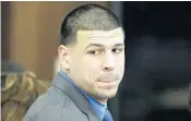  ?? STEPHAN SAVOIA/AP ?? Aaron Hernandez reacts to Friday’s acquittal. He already is serving a life term for a 2013 murder.