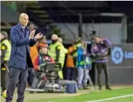  ?? AP ?? Zinedine Zidane applauding his team from the sidelines. —