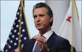  ?? RICH PEDRONCELL­I — THE ASSOCIATED PRESS ?? Gov. Gavin Newsom updates the state’s response to the coronaviru­s at the Governor’s Office of Emergency Services in Rancho Cordova on Monday.