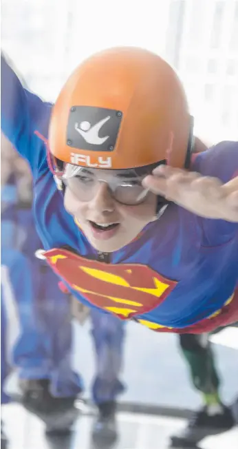  ??  ?? Taman Bunker does a great Superman impersonat­ion at iFly in Surfers Paradise.