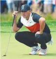  ??  ?? FOCUS: Brooks Koepka lines up a putt on the 7th green.