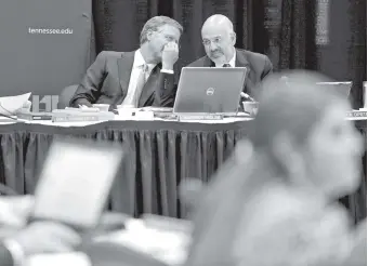  ?? KNOXVILLE NEW SENTINEL FILE PHOTO ?? Gov. Bill Haslam, left, talks with then-University of Tennessee President Joe DiPietro during a board of trustees meeting June 21, 2012, at UT.