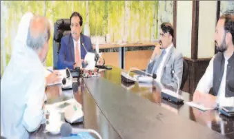  ?? -APP ?? Adviser to the PM / Federal Minister for Climate Change, Malik Amin Aslam chairing a meeting with FAO delegation.