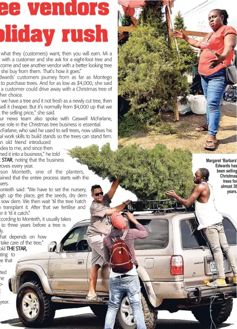  ??  ?? These men help David Dukharan (left) to get the tree on top of his vehicle. Margaret ‘Barbara’ Edwards has been selling Christmas trees for almost 30 years.