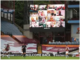  ??  ?? Deserted...fans watching on screen at empty Villa Park last night