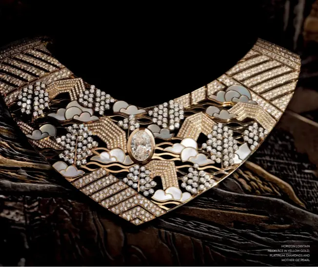  ??  ?? HORIZON LOINTAIN NECKLACE IN YELLOW GOLD, PLATINUM, DIAMONDS AND MOTHER- OF- PEARL