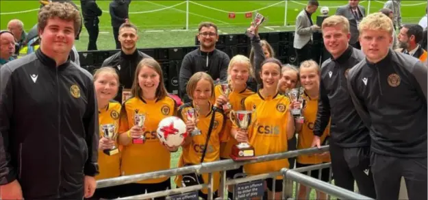  ?? ?? Palace Wood School, representi­ng Maidstone United, celebrate Wembley glory in the National League Trust Under-11 Girls' Cup final