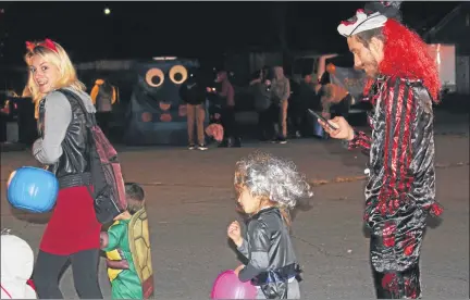  ?? MEDIANEWS GROUP FILE PHOTO ?? A family dressed in Halloween costumes came out to a block party in Pottstown on Halloween. The event was called the Light in the Night Safe Zone and was offered as a safe trick-or-treating option for children in the area.