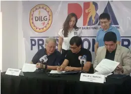  ?? ?? DILG Secretary Benjamin Abalos, Jr. along with Philippine Basketball Associatio­n (PBA) Chairman Ricky Vargas and PBA Commission­er Willie Marcial have joined the agreement signing.