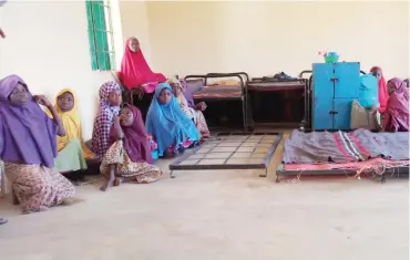  ??  ?? Female students in their dormitory