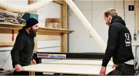  ??  ?? 1 1.
Joe and Paul load a sheet of wood onto an awaiting CNC machine ready to be cut to shape