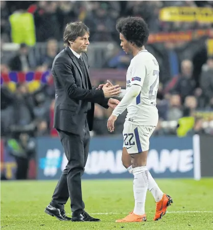  ??  ?? Chelsea manager Antonio Conte and midfielder Willian look dejected after the match against Barcelona at the Camp Nou.