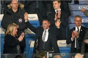  ?? AP ?? Brendan Rodgers, who was named Leicester City’s new manager, waves to fans during Leiceter’s match against Brighton yesterday.