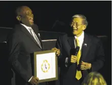  ??  ?? Former San Francisco Mayor Willie Brown (left) presents the Asian Pacific American Heritage Award for Lifetime Impact to former San Jose Mayor Norm Mineta at CAAMFest.