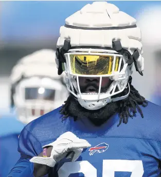  ?? JOSHUA BESSEX/AP ?? Bills defensive end Mario Addison runs during practice at training camp July 31 in Orchard Park, N.Y.