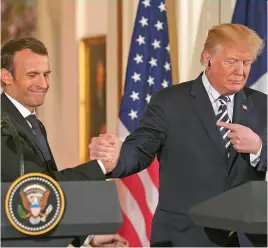  ?? (Doug Mills/The New York Times) ?? U.S. President Donald Trump and French President Emmanuel Macron during a joint news conference in the East Room of The White House, April 24, 2018.